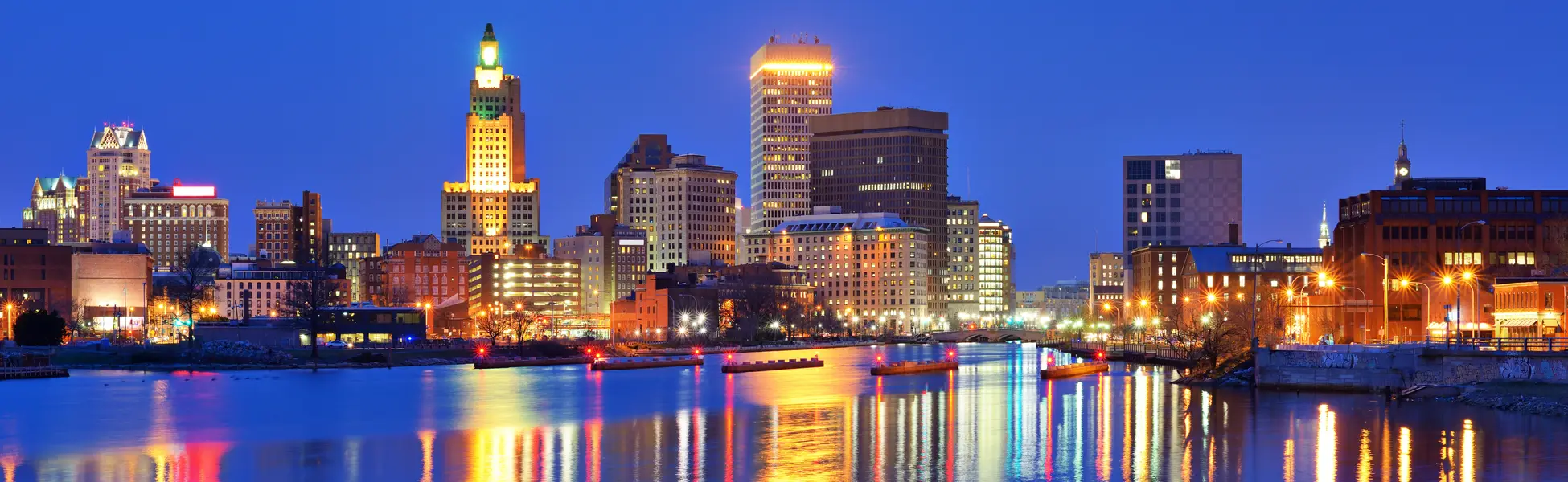 Neon color image of a band playing and people singing along